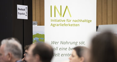 © GIZ INA Banner auf einer Veranstaltung